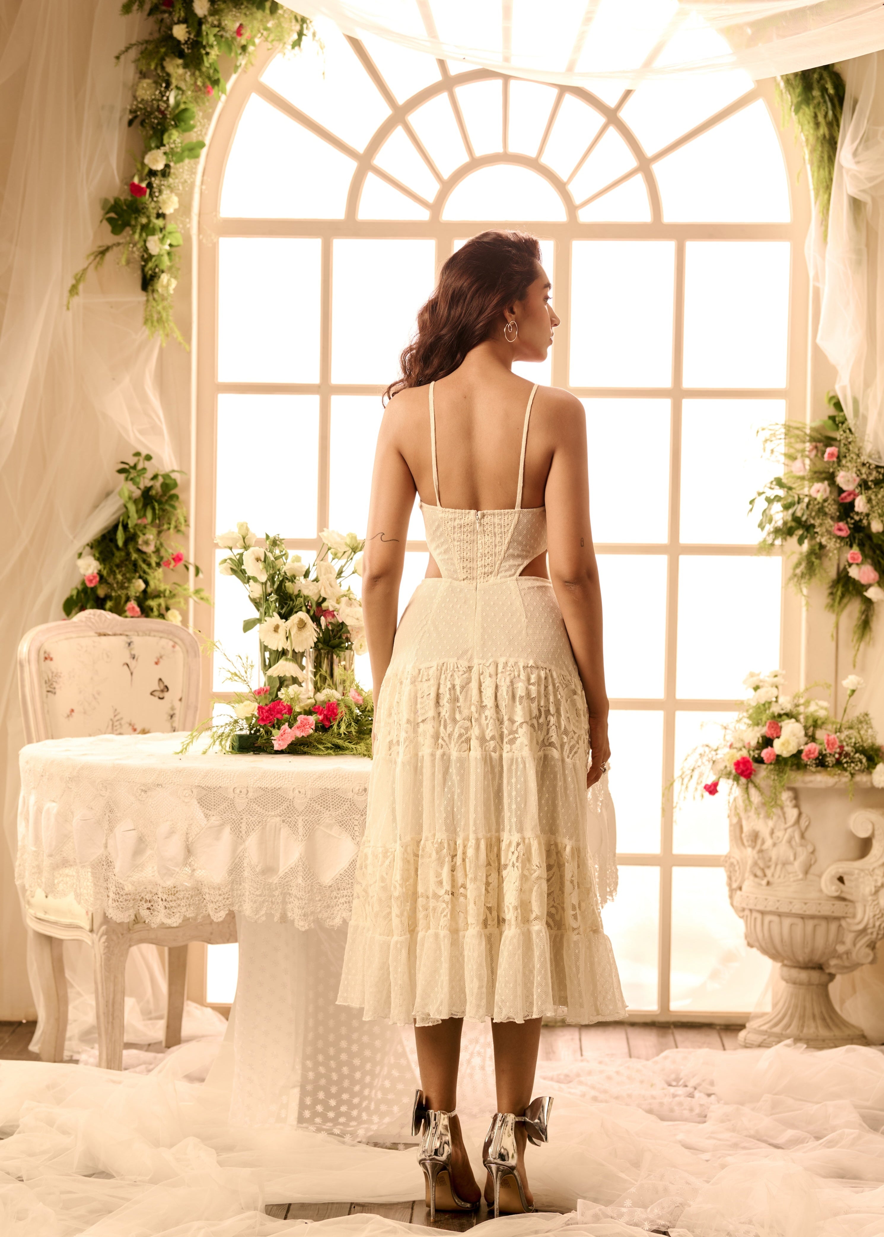 Willow White Cutout Dress with pearl embroidery, showcasing intricate pearl details and elegant cutout design in a pristine white fabric