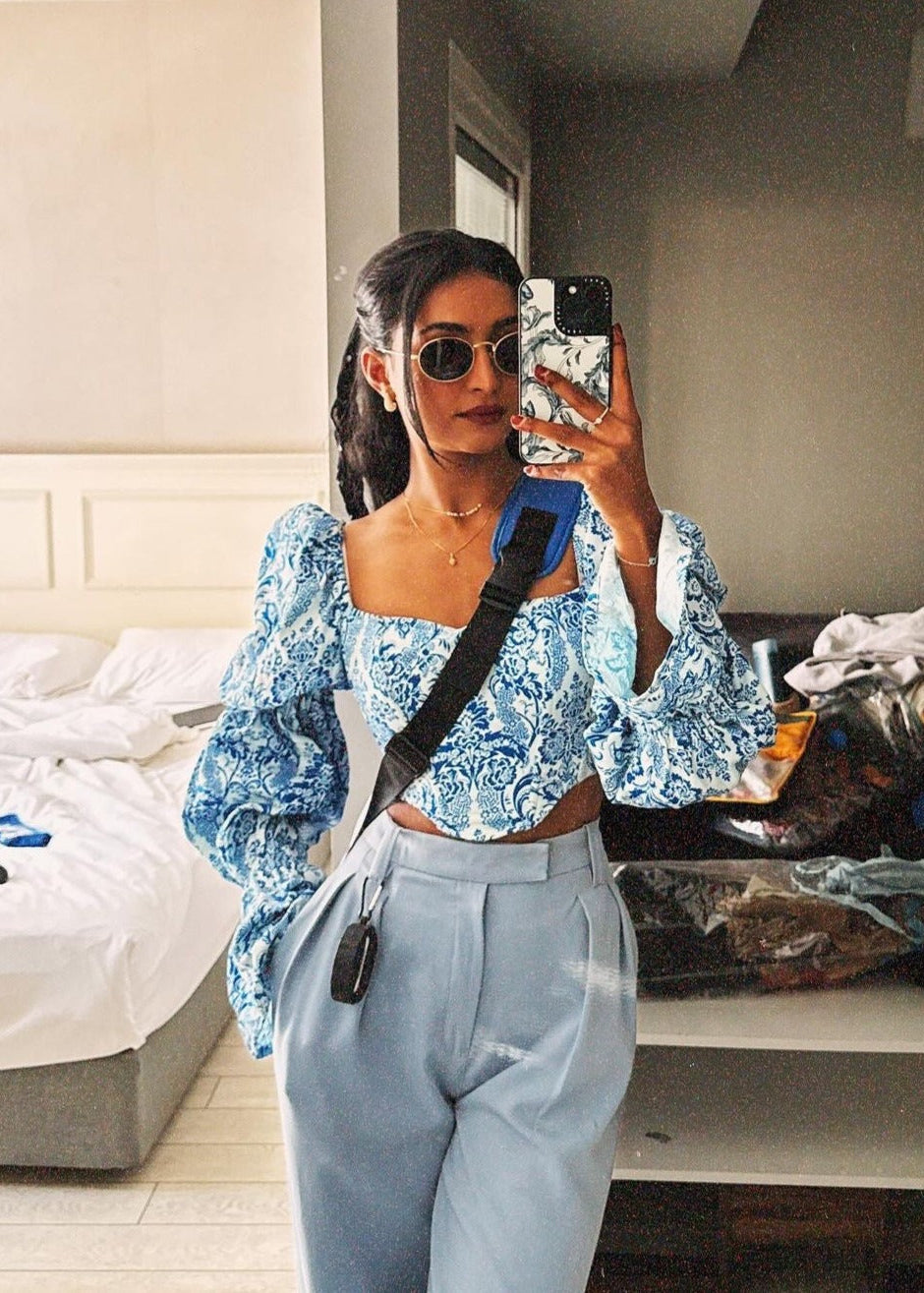 Yelena Blue and White Corset and Pants Set featuring a stylish design with contrasting colors and a flattering fit