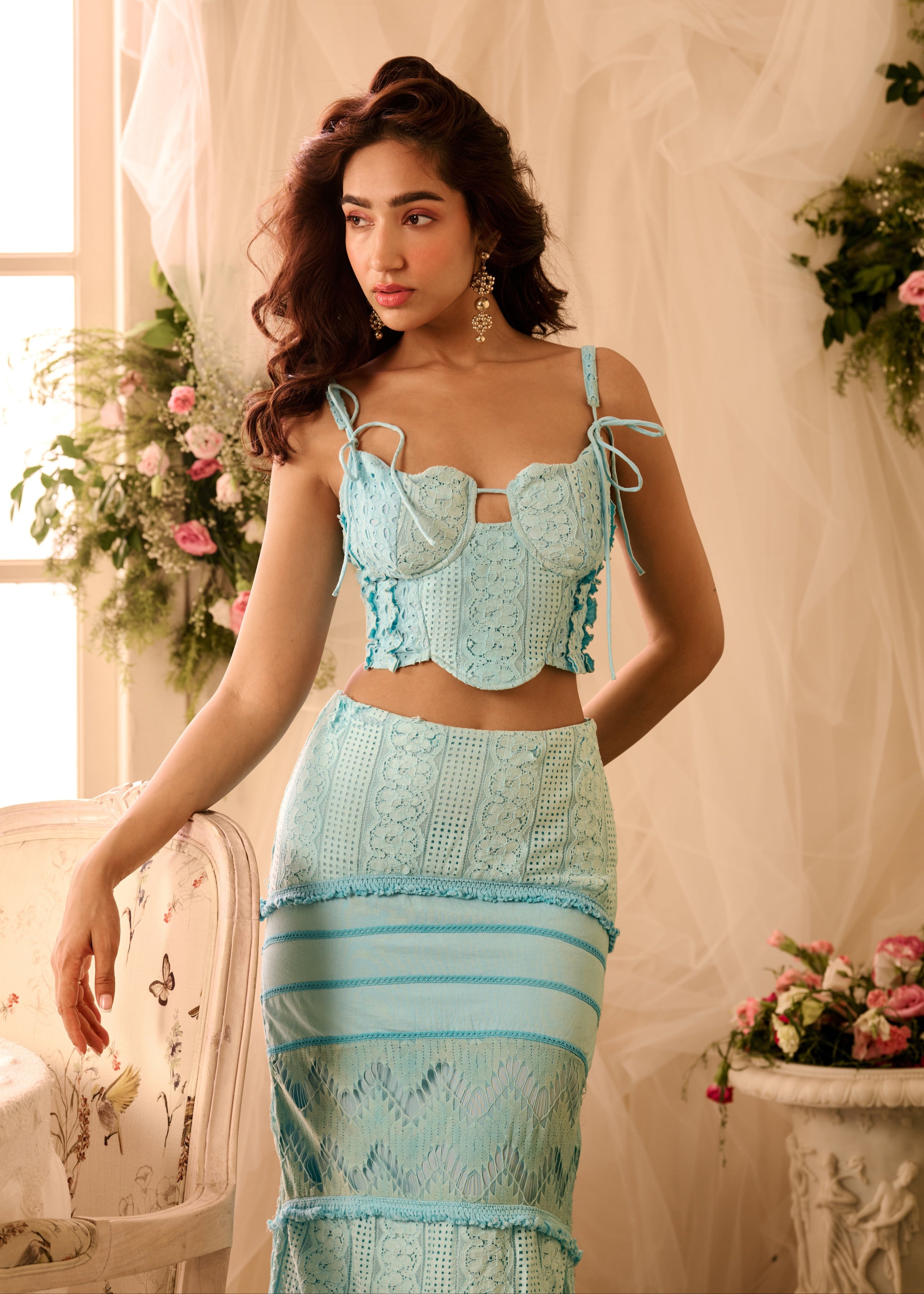 Zita Powder Blue Coord Set with a matching crop top and high-waisted pants in a soft powder blue fabric, offering a chic and coordinated look