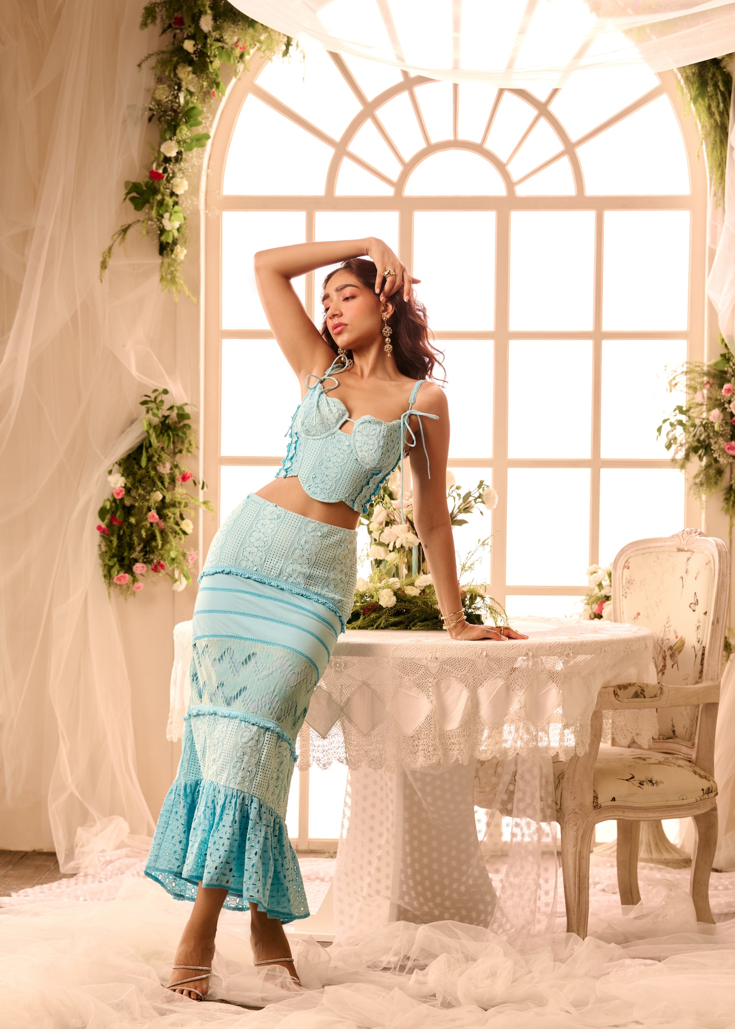 Zita Powder Blue Coord Set with a matching crop top and high-waisted pants in a soft powder blue fabric, offering a chic and coordinated look