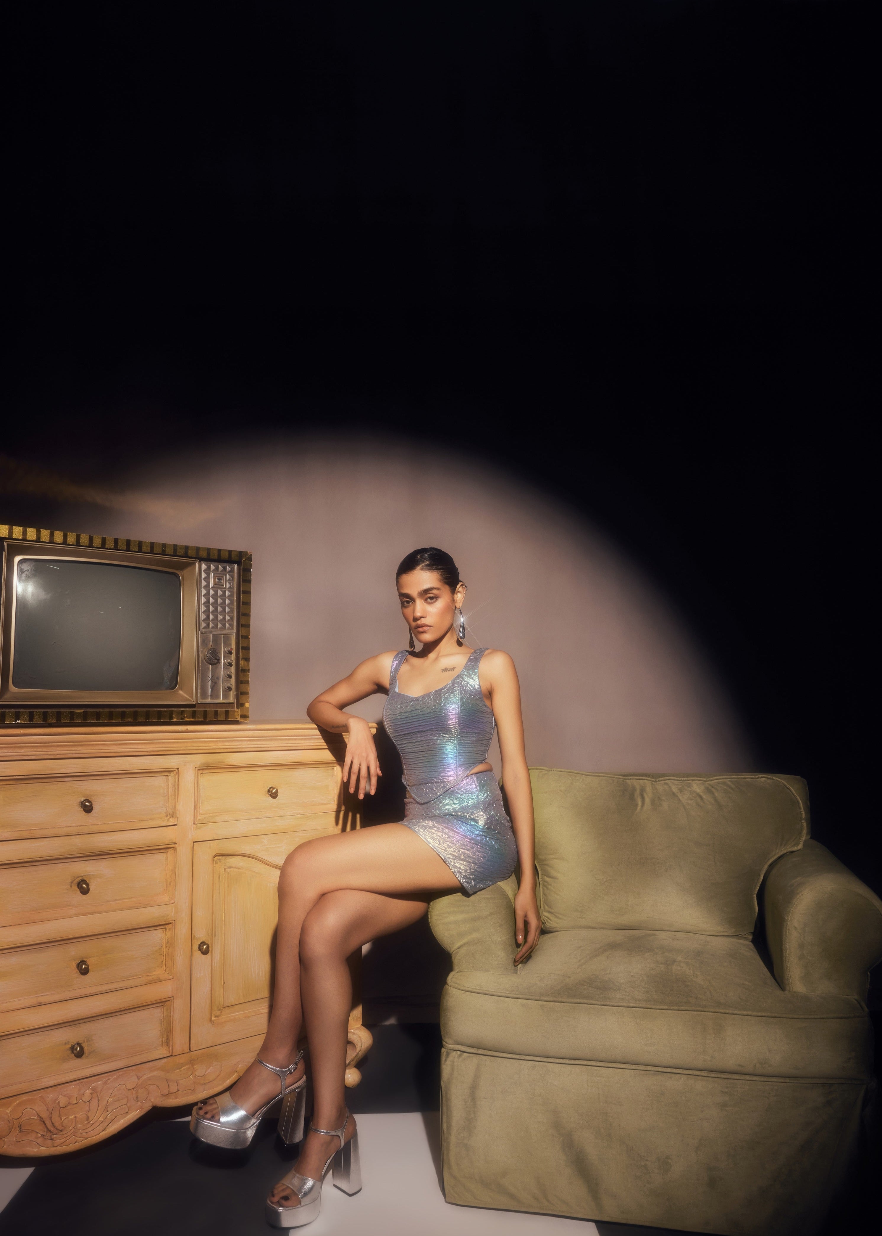 Zola Rainbow Holographic Corset and Mini Skirt Set, featuring a dazzling holographic finish and trendy design