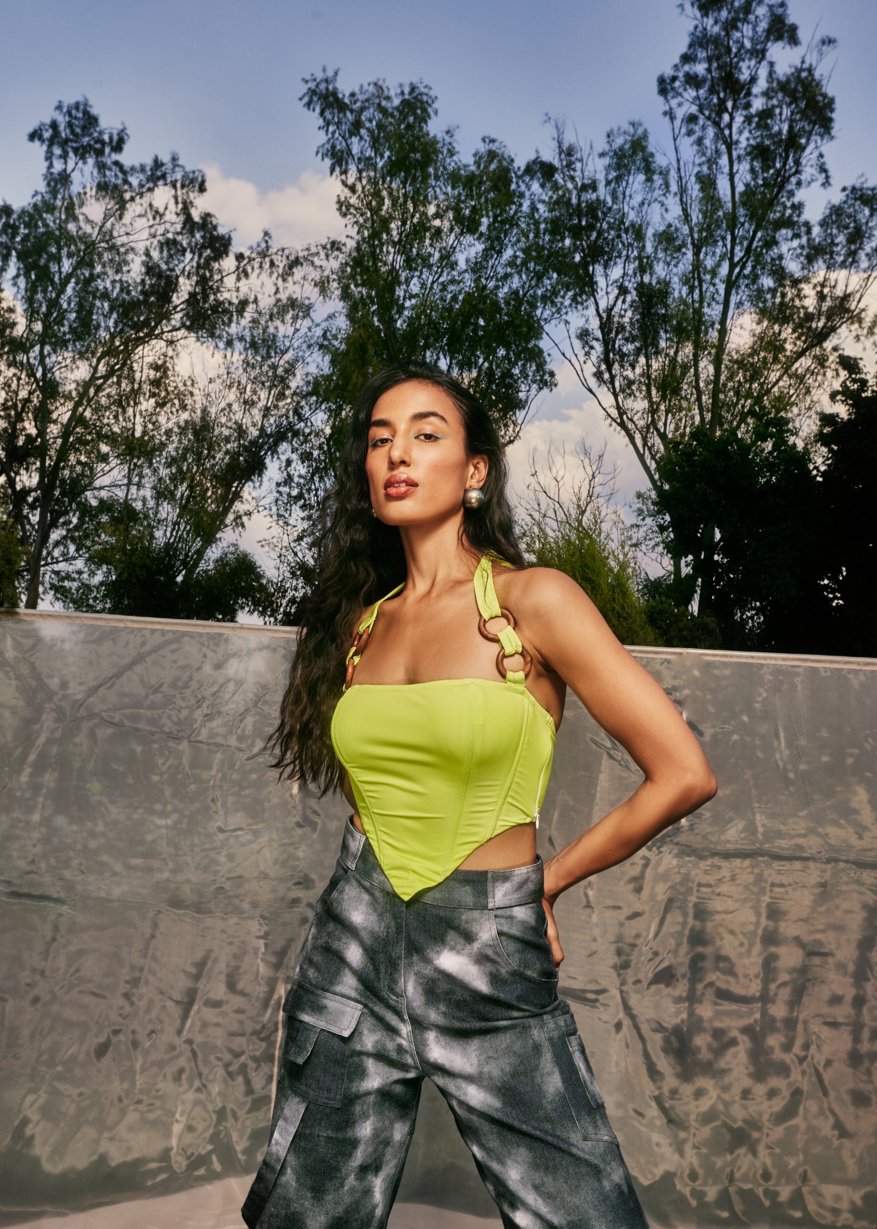 Danae Green Asymmetrical Corset Top featuring a unique asymmetrical design in a bold green color