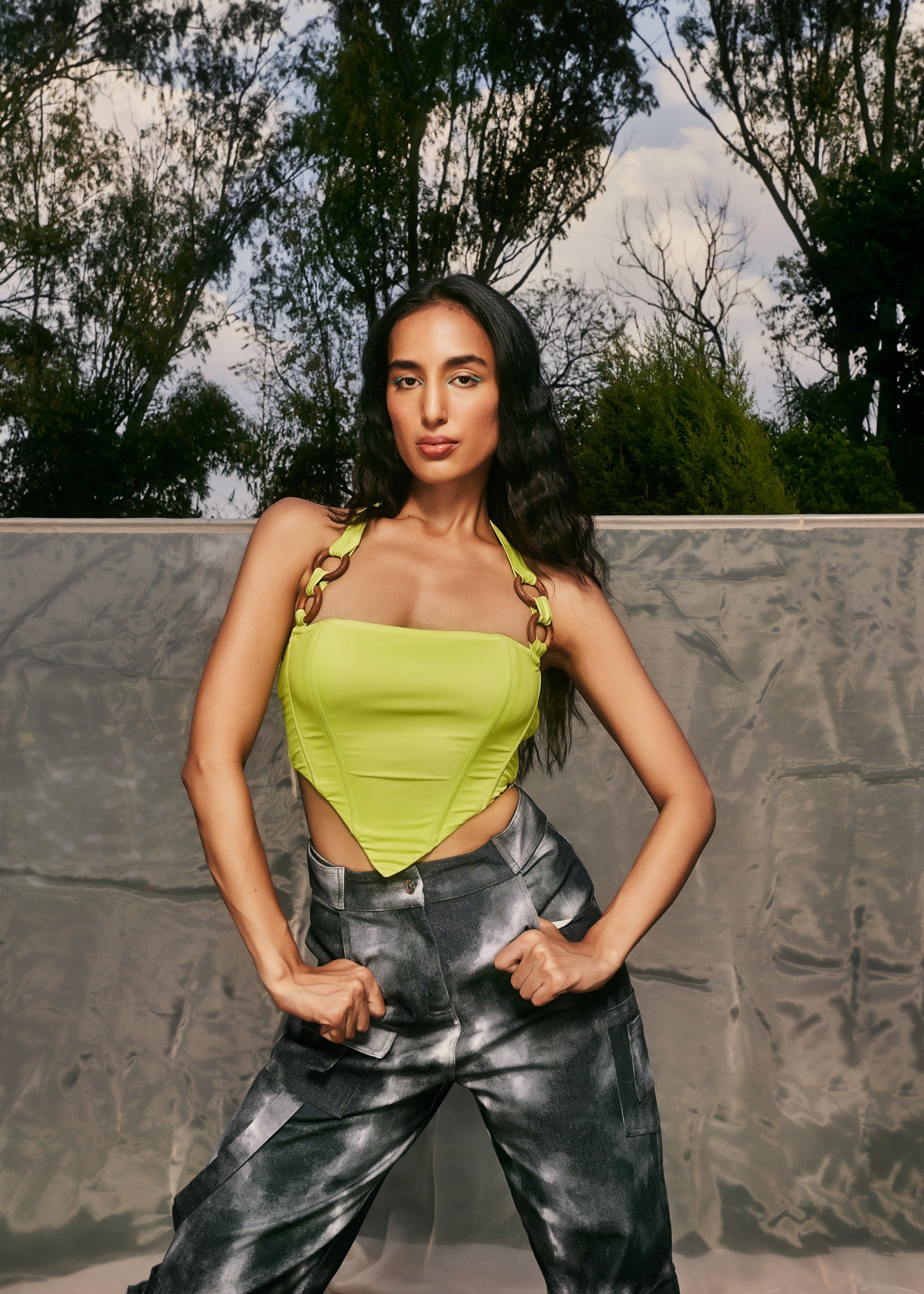 Danae Green Asymmetrical Corset Top featuring a unique asymmetrical design in a bold green color