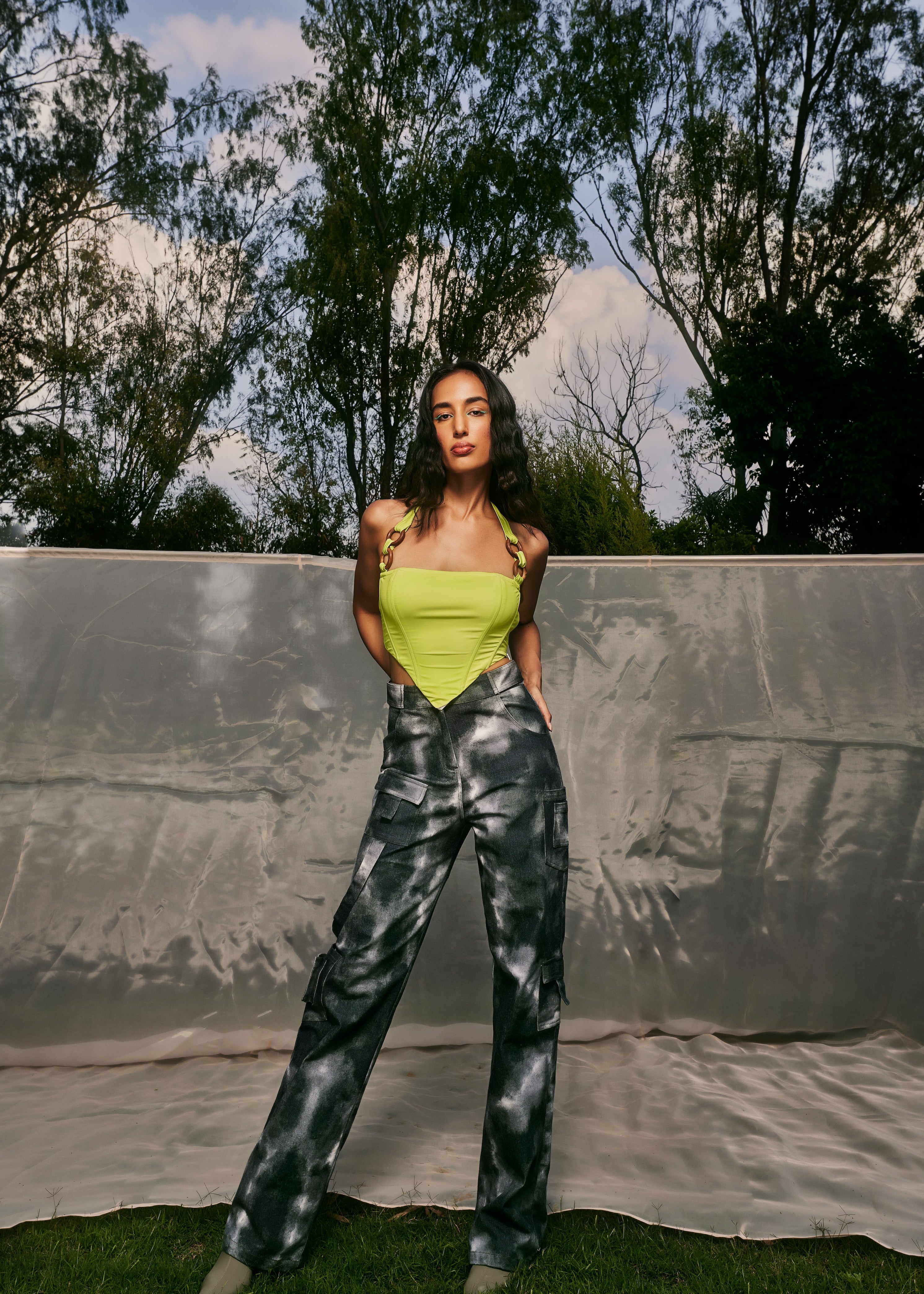 Danae Green Asymmetrical Corset Top featuring a unique asymmetrical design in a bold green color