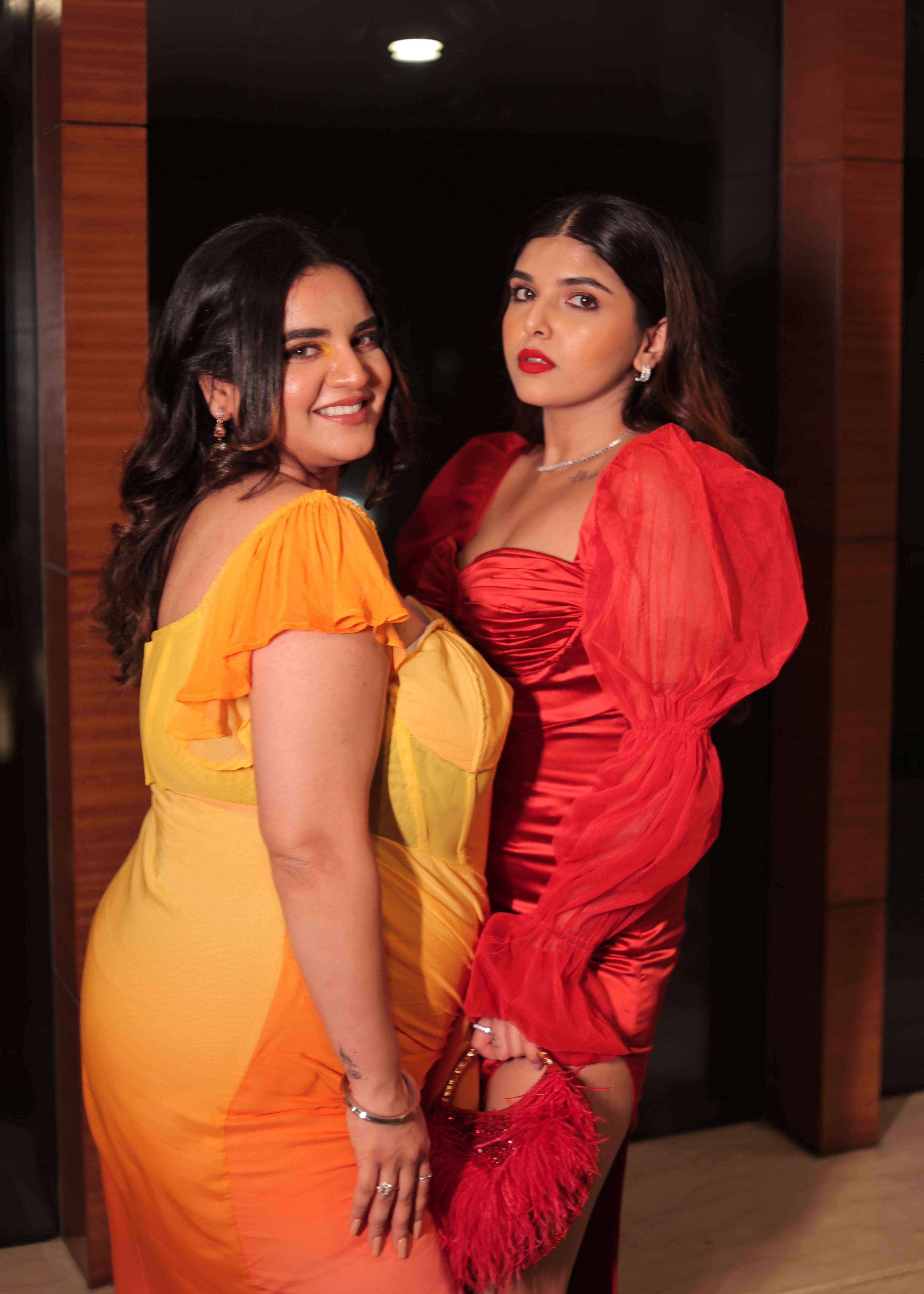 Scarlet Red Satin Puff Sleeve Bustier Gown with a striking red satin fabric, puff sleeves, and a bustier-style bodice