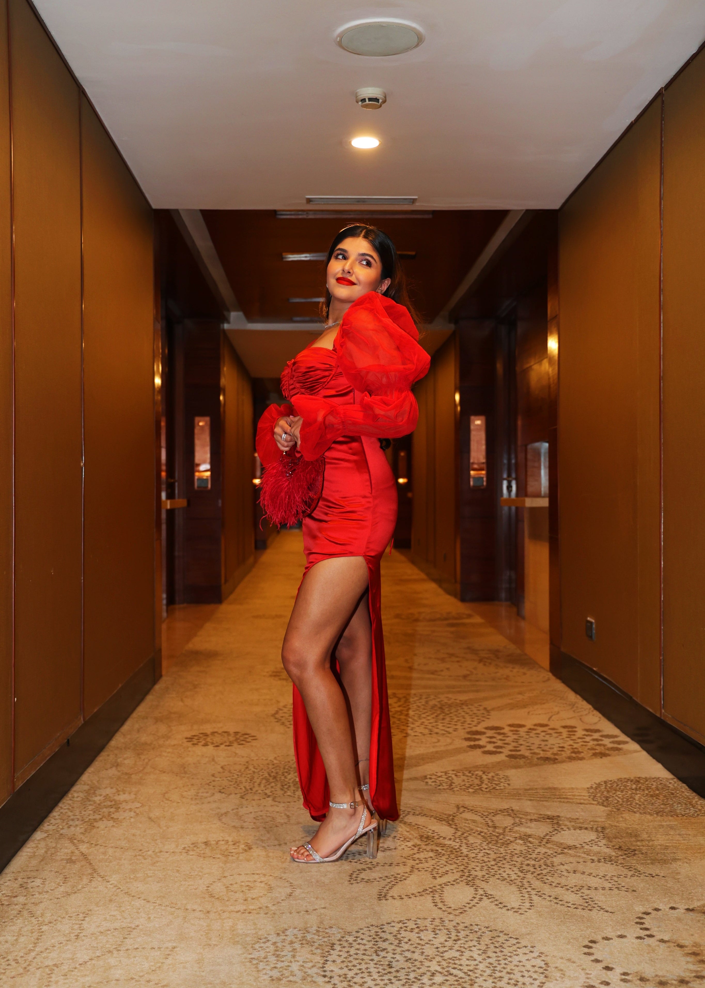 Scarlet Red Satin Puff Sleeve Bustier Gown with a striking red satin fabric, puff sleeves, and a bustier-style bodice