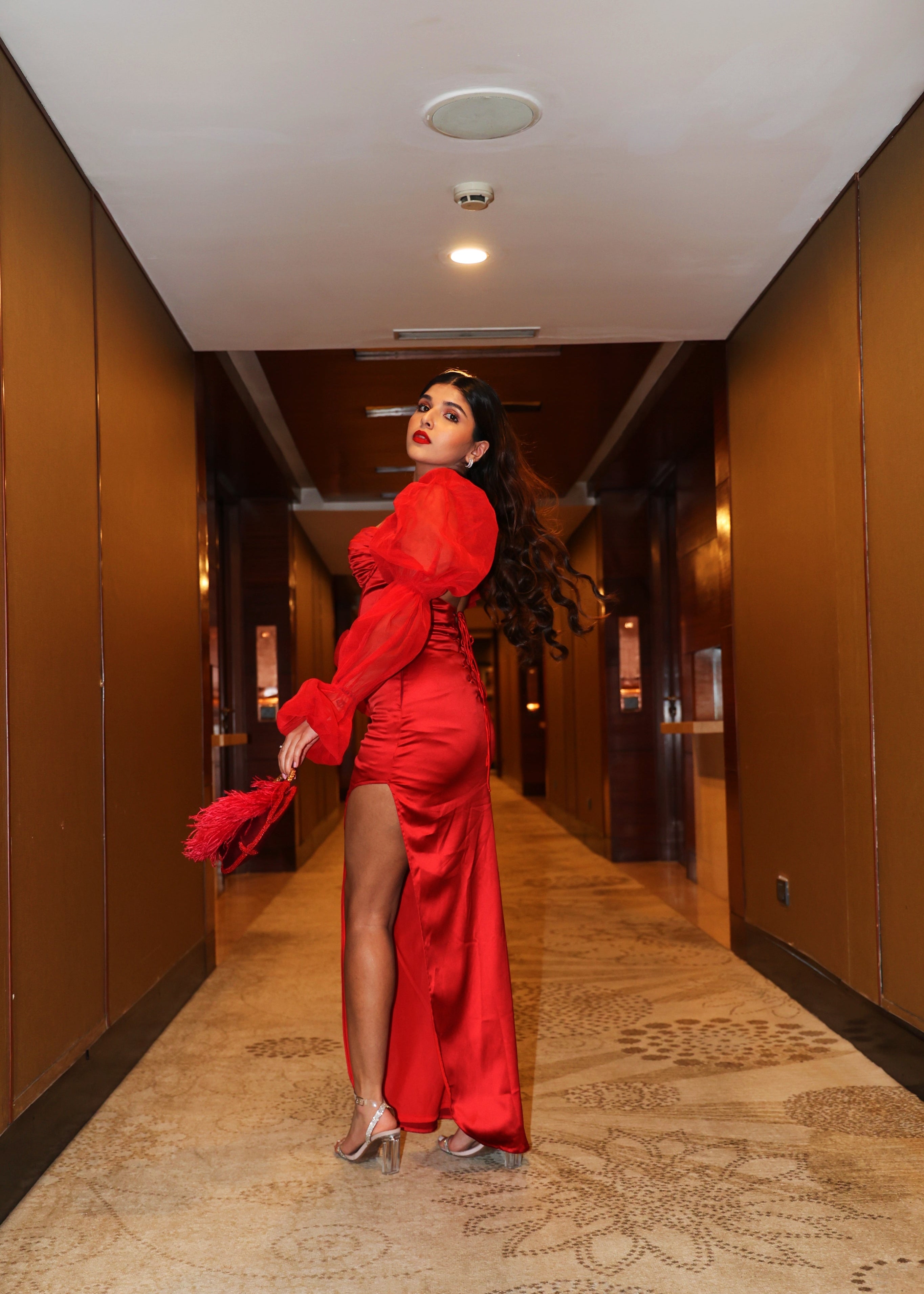 Scarlet Red Satin Puff Sleeve Bustier Gown with a striking red satin fabric, puff sleeves, and a bustier-style bodice
