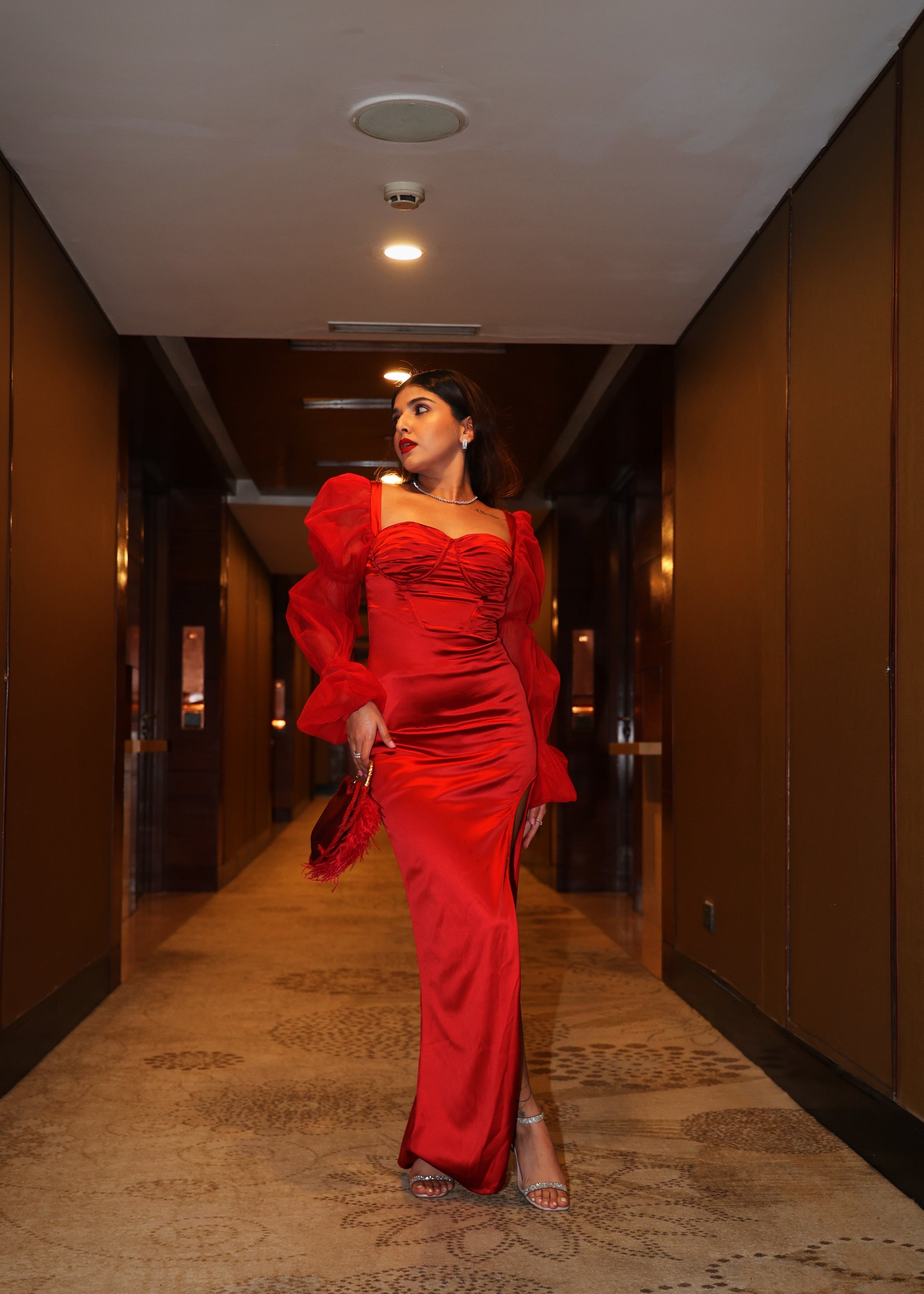 Scarlet Red Satin Puff Sleeve Bustier Gown with a striking red satin fabric, puff sleeves, and a bustier-style bodice
