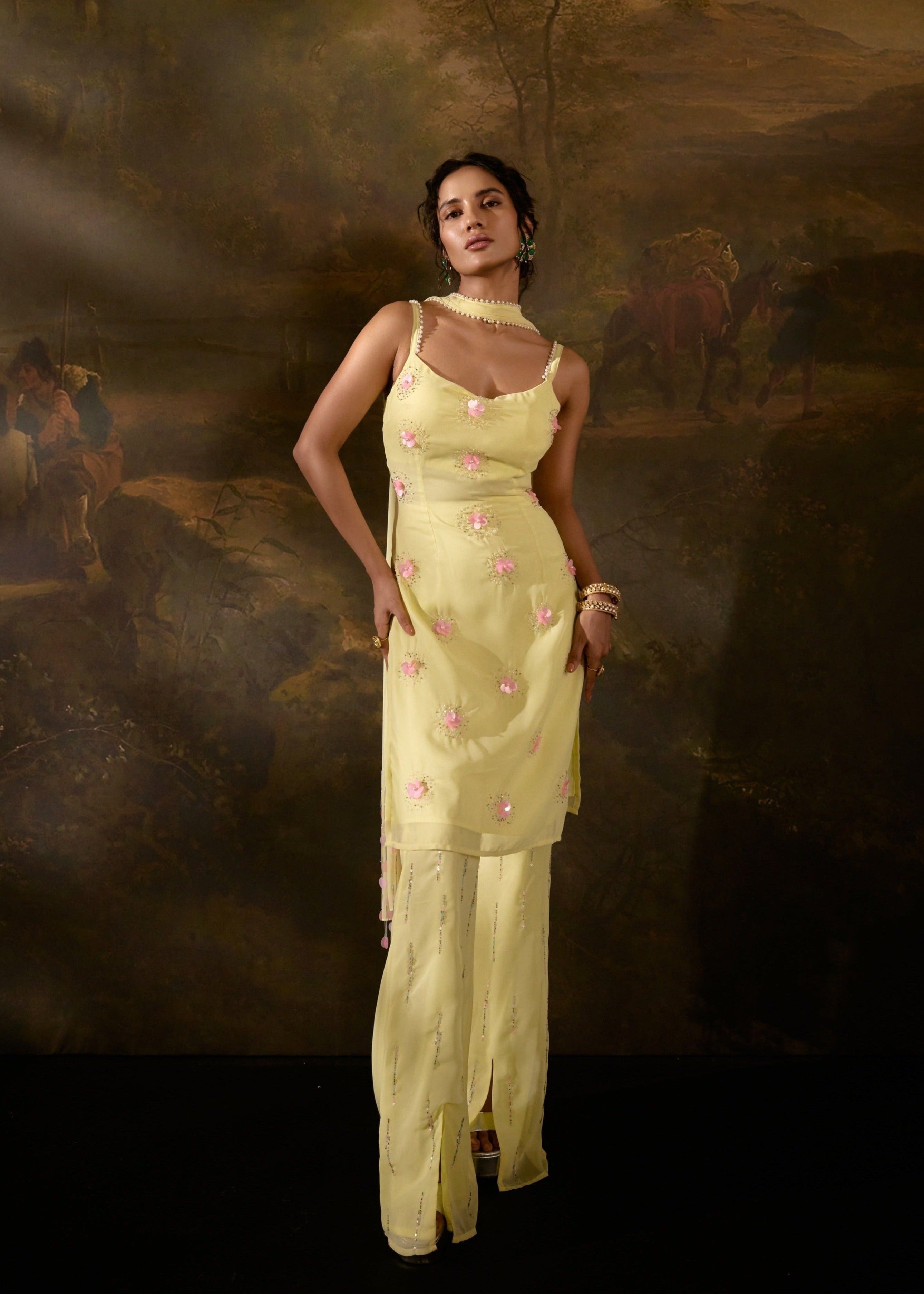 "Chanda Yellow Embroidered Kurta Set: Bright yellow kurta set adorned with intricate embroidery for a traditional yet vibrant look."