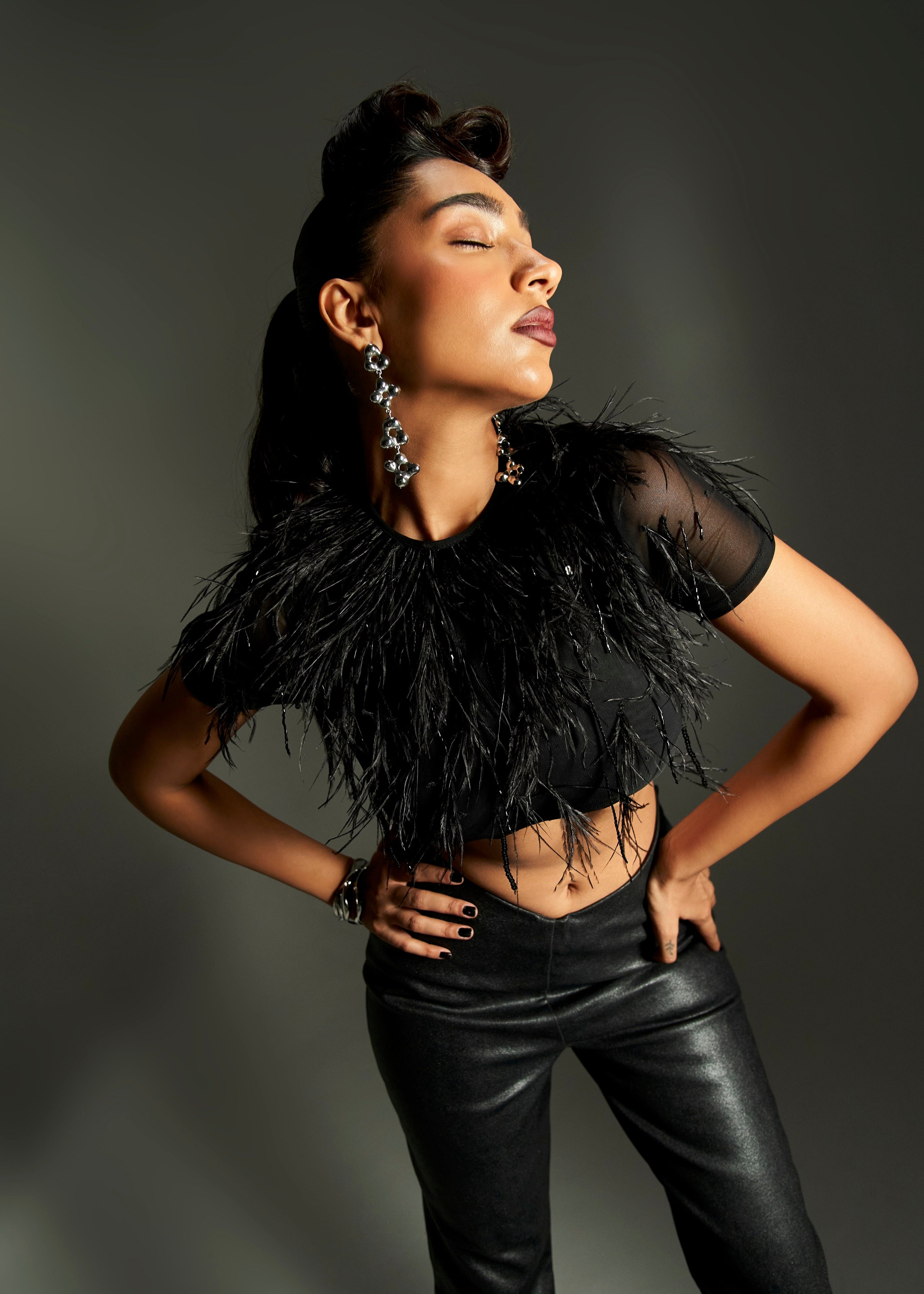 Isla Black Feather Embellished Crop Top & Pant Set featuring a feather-adorned crop top and matching pants
