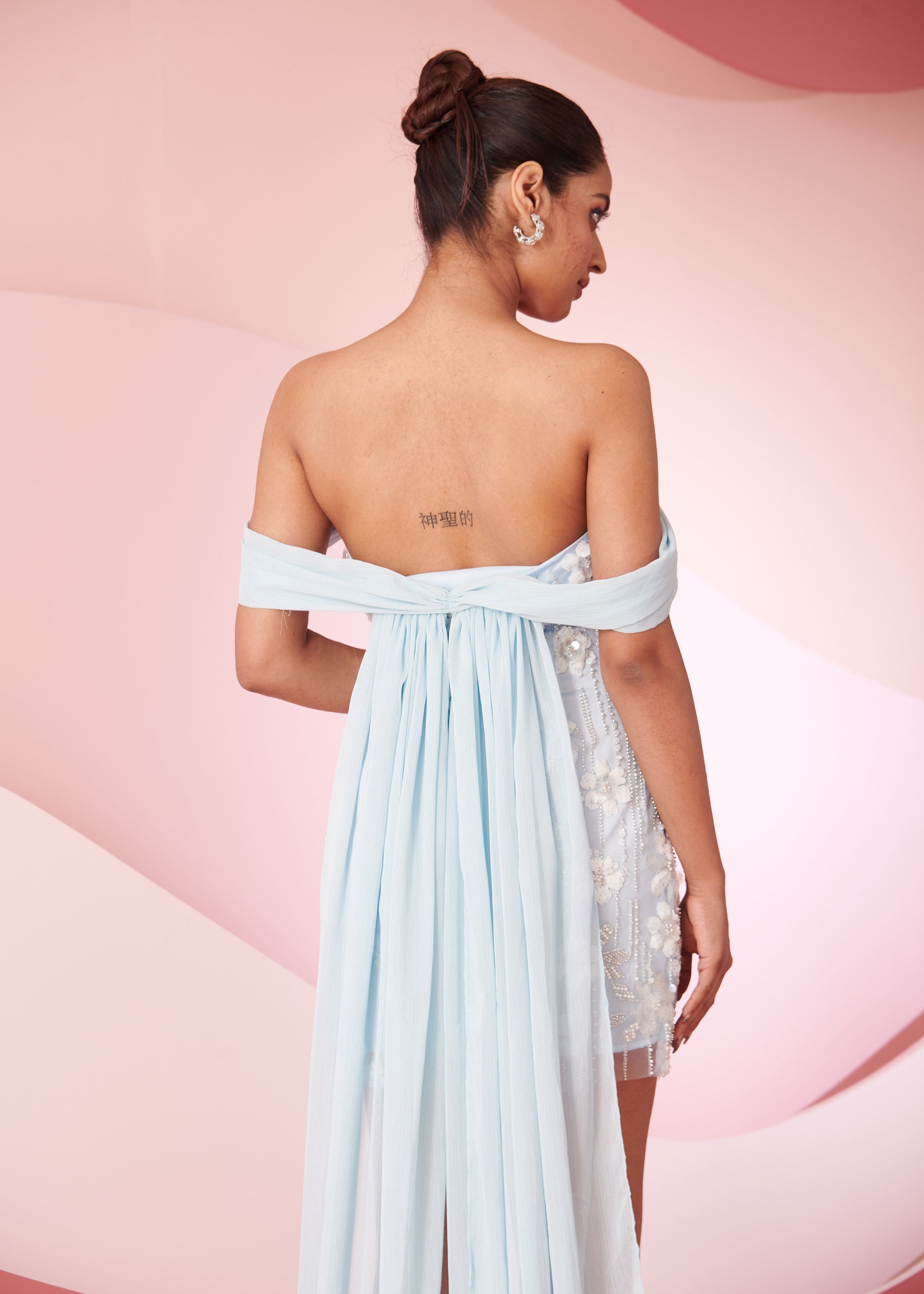 Neliah blue floral embroidery corset dress featuring intricate floral embroidery and a fitted corset design, ideal for elegant events.