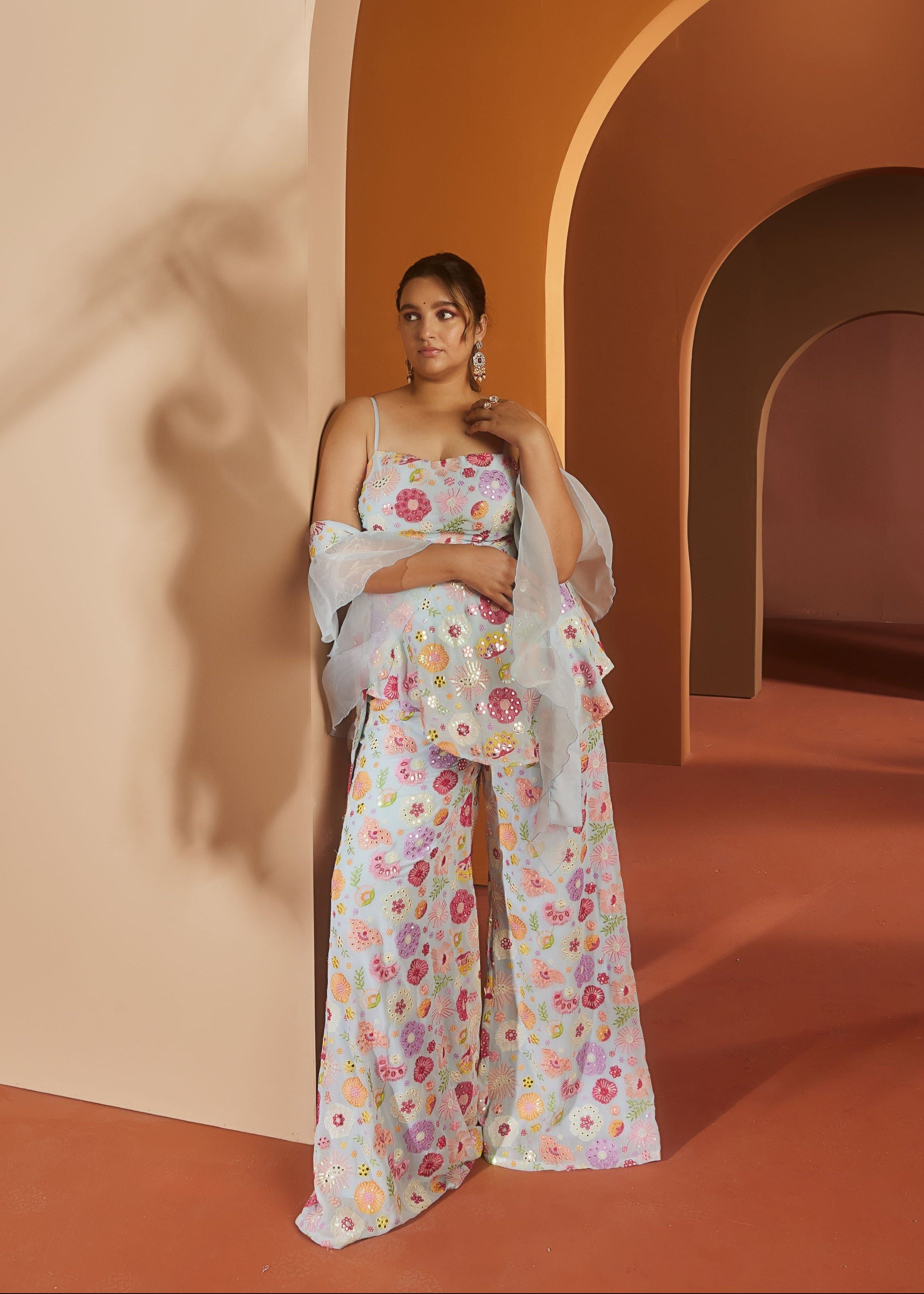 Shyla Baby Blue Embroidered Sharara Set with intricate embroidery on a soft blue fabric for a chic and graceful look