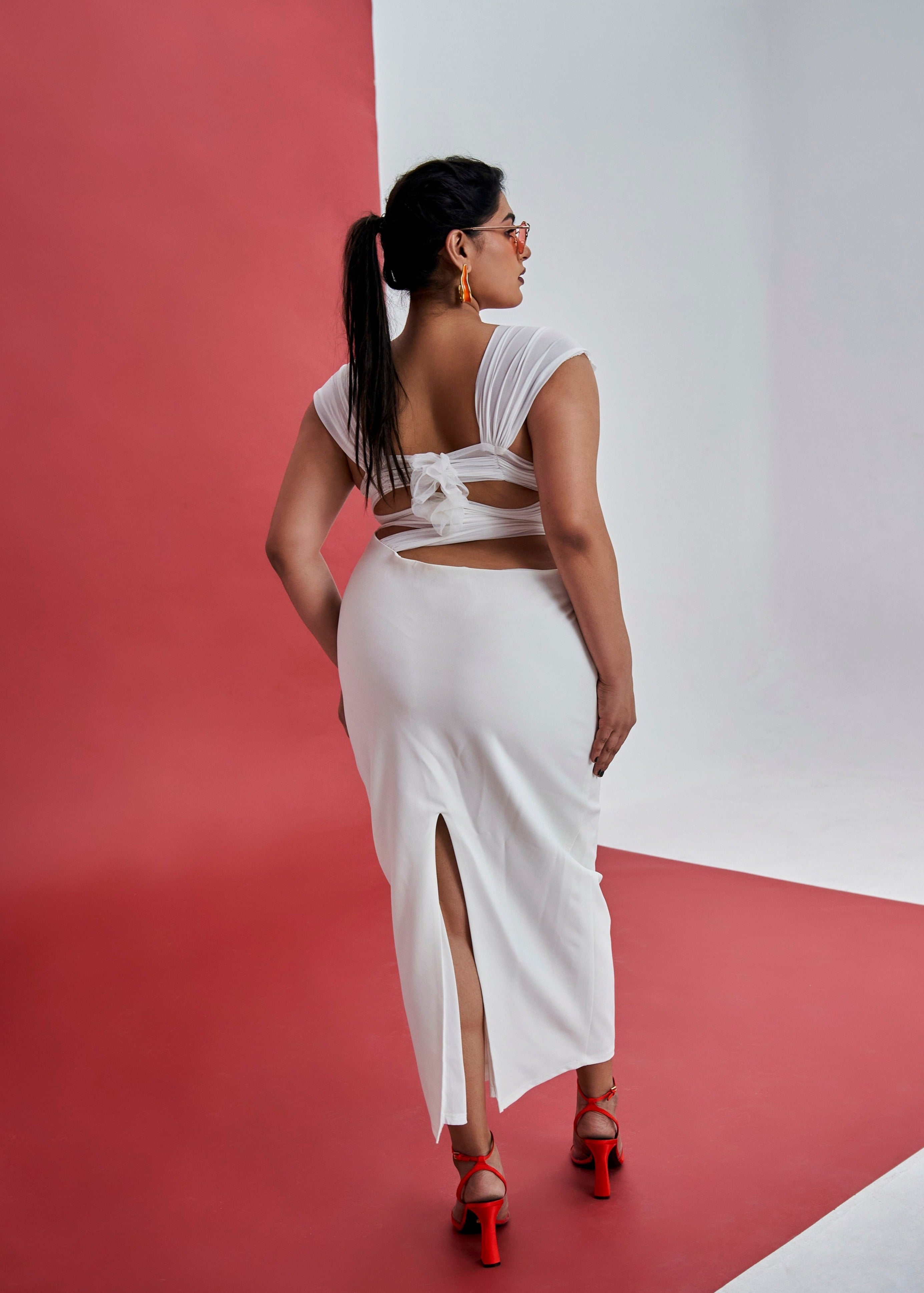 Sorelle White Cutout Coord Set with Bow Detailing featuring stylish cutouts and charming bow accents