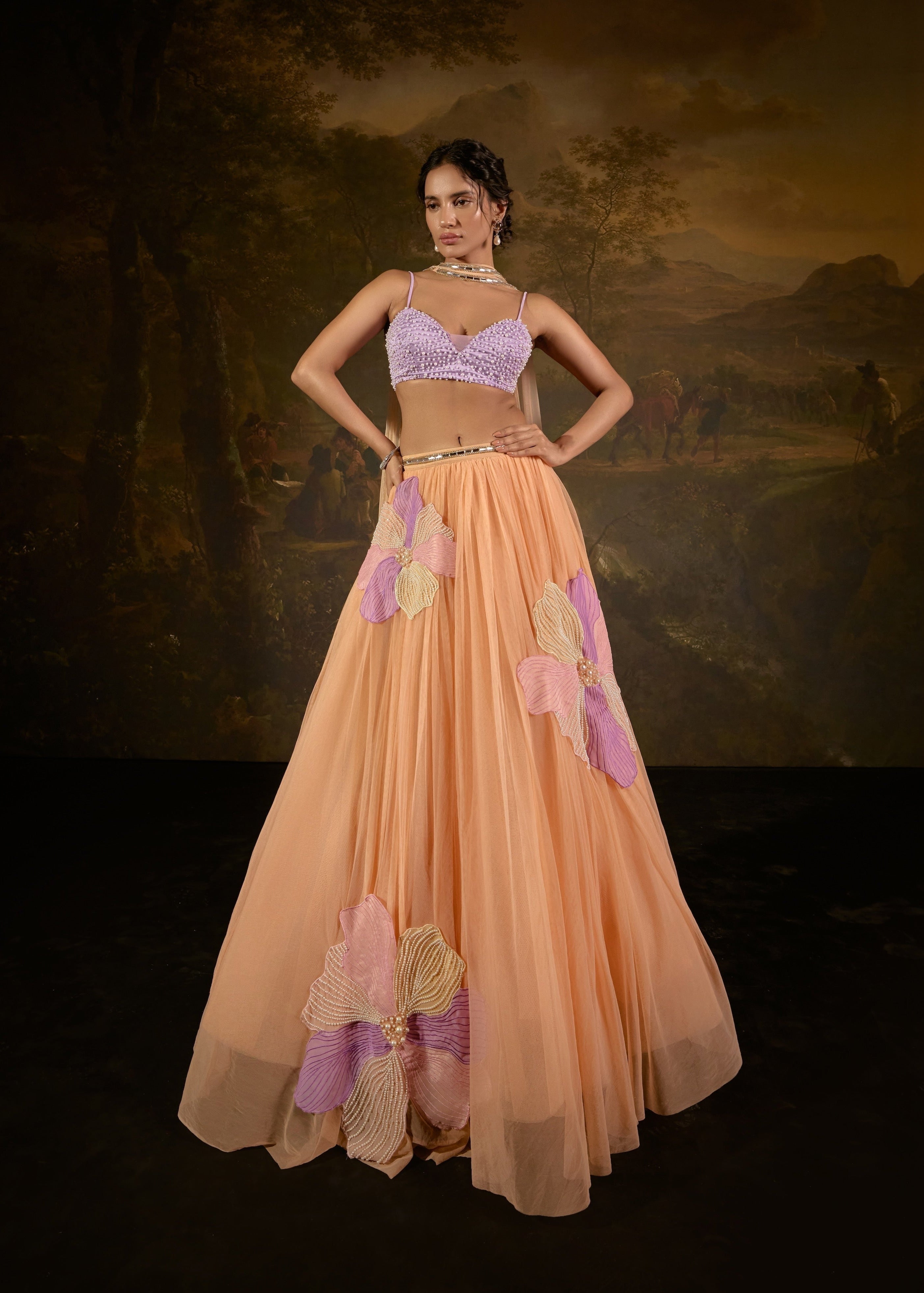 "Tasmeekh Lavender And Orange Embroidered Lehenga Set: Vibrant lehenga set with intricate embroidery in lavender and orange, perfect for a festive look."