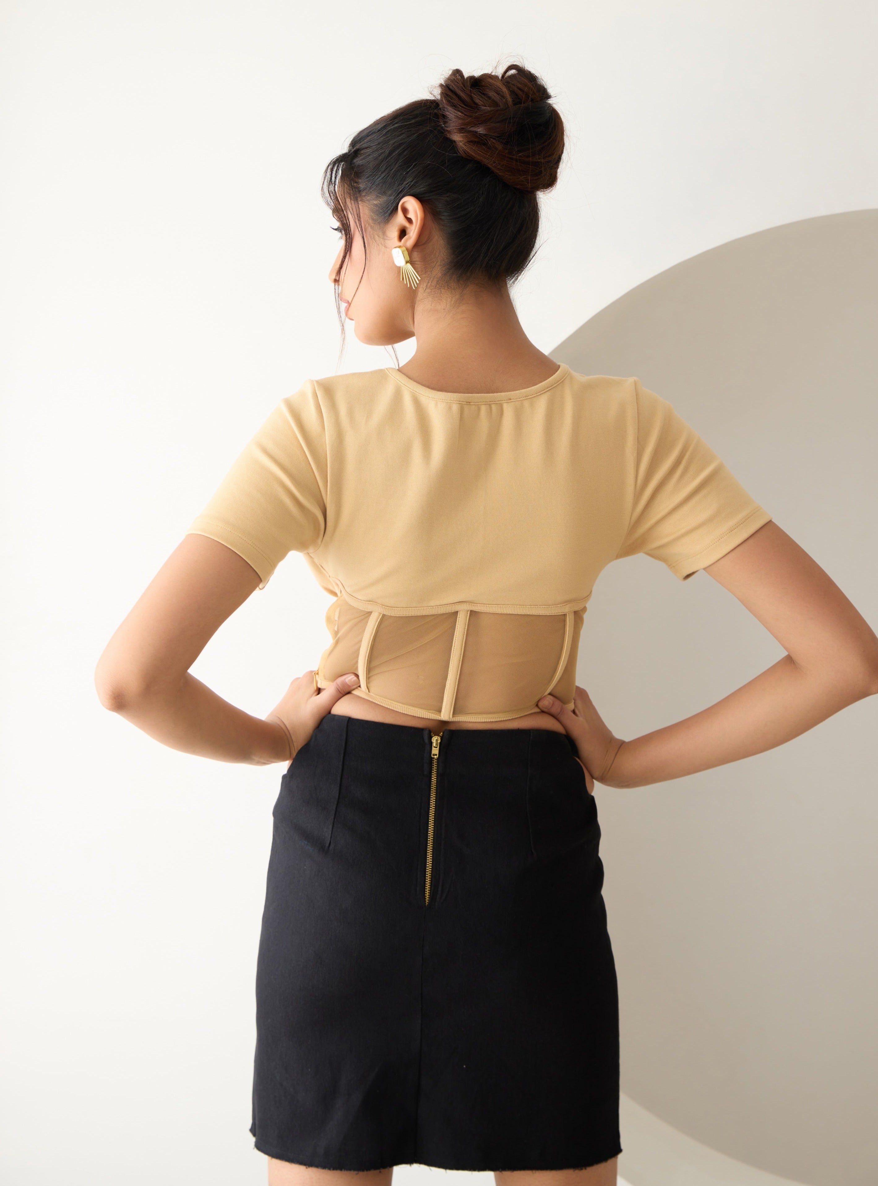 Twyla Beige Mesh Corset T-Shirt featuring a fitted mesh overlay and a stylish corset design