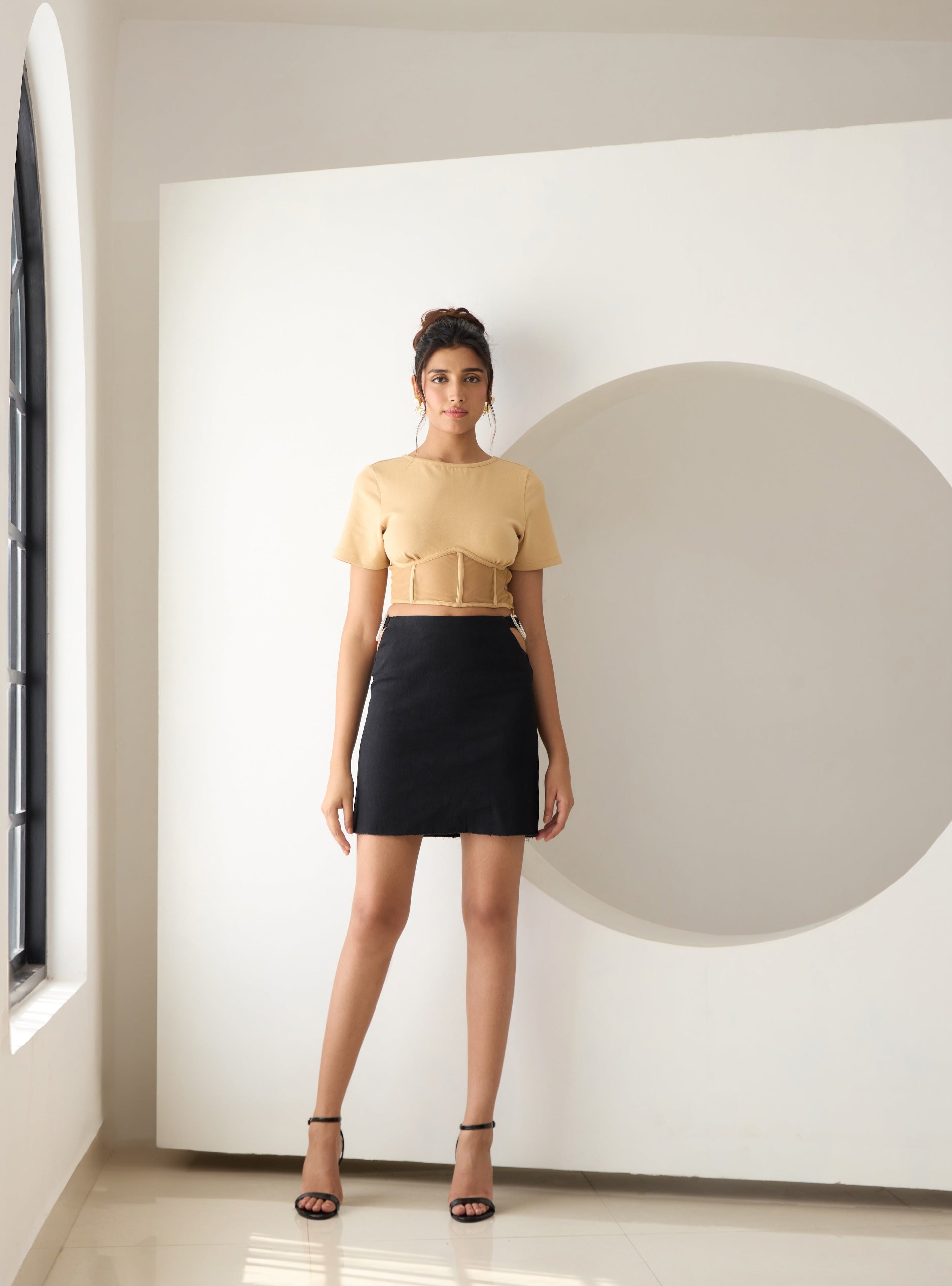 Twyla Beige Mesh Corset T-Shirt featuring a fitted mesh overlay and a stylish corset design