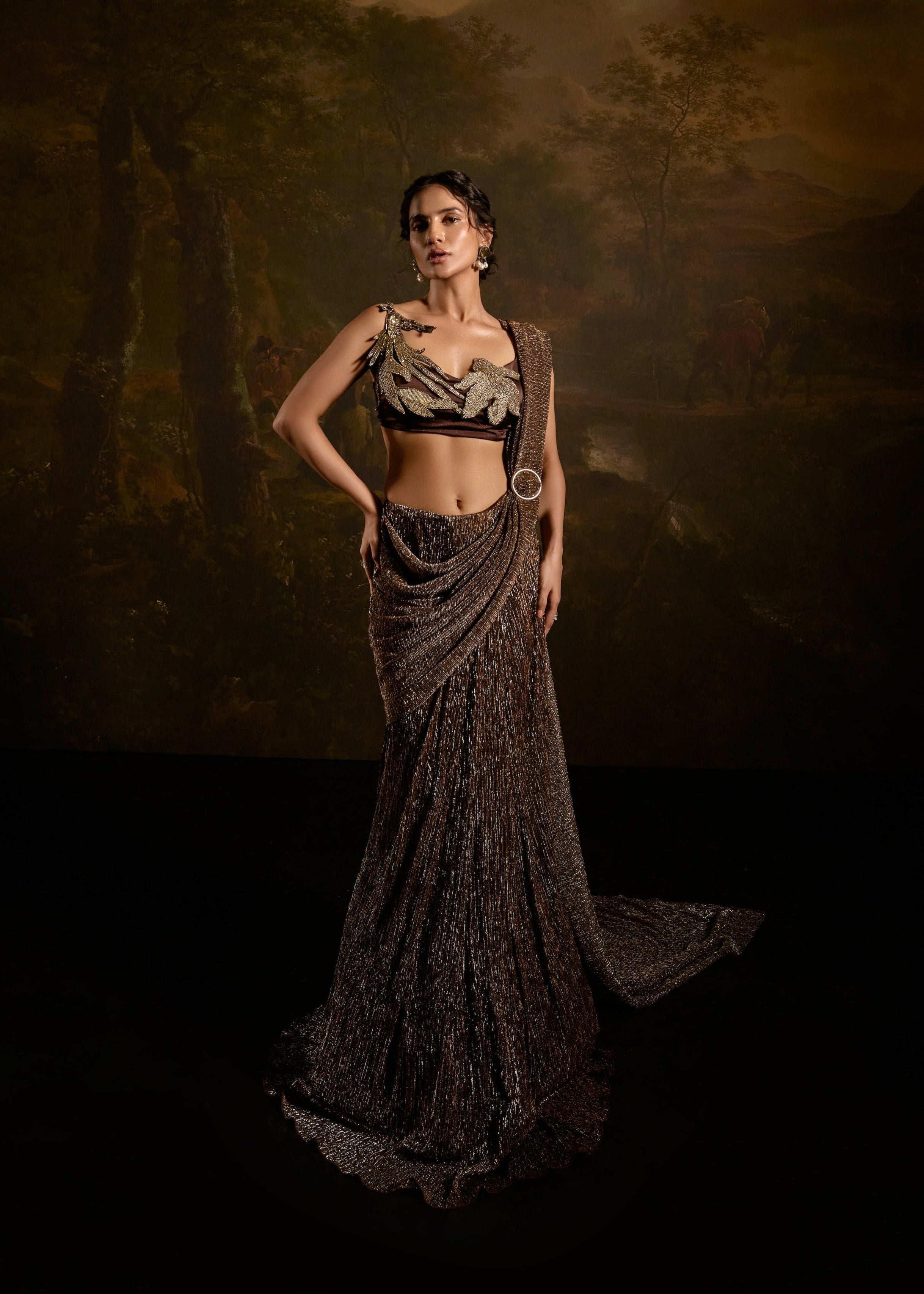 "Zaalima Brown Shimmer Pre-Draped Saree: Shimmering brown pre-draped saree, exuding glamour and sophistication."