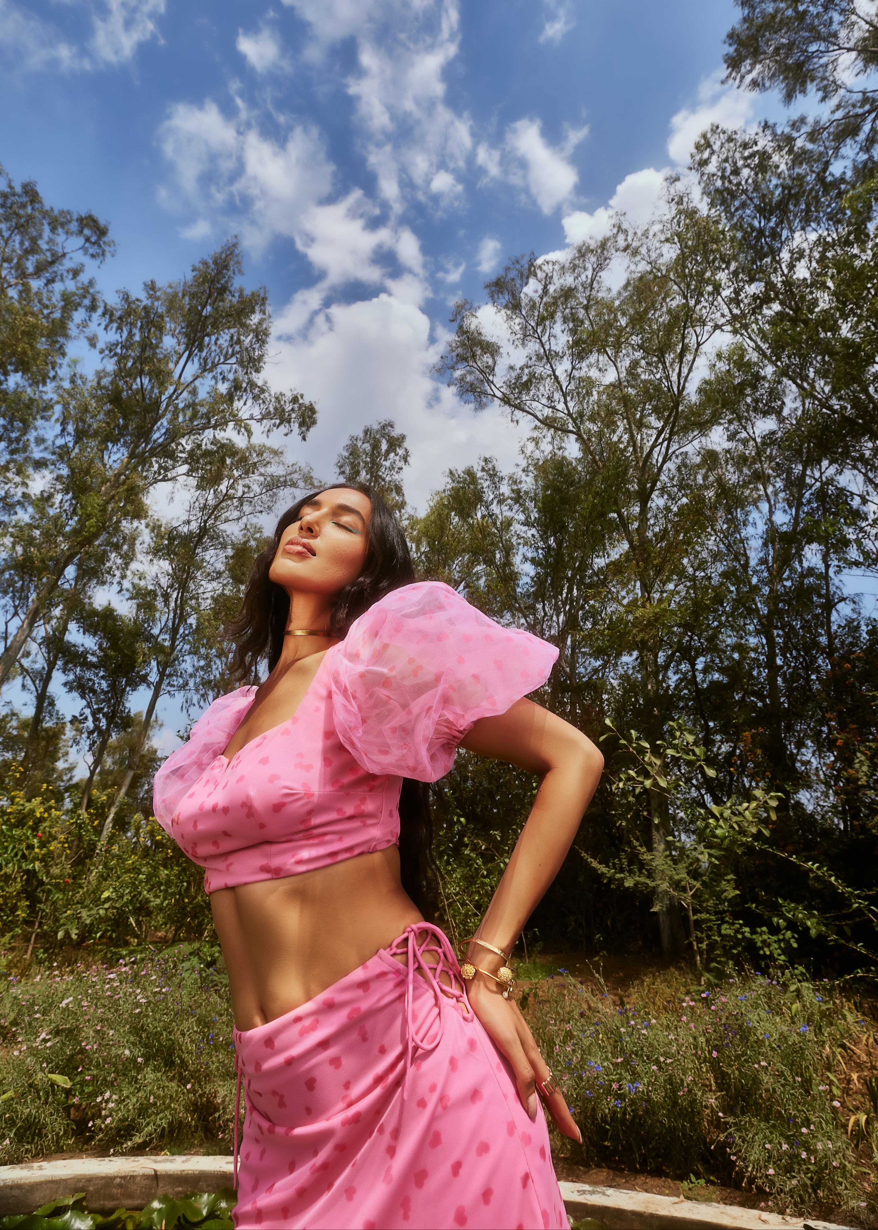 Cleo Pink Heart Print Coord Set with a playful heart pattern on both the top and bottoms in a vibrant pink hue