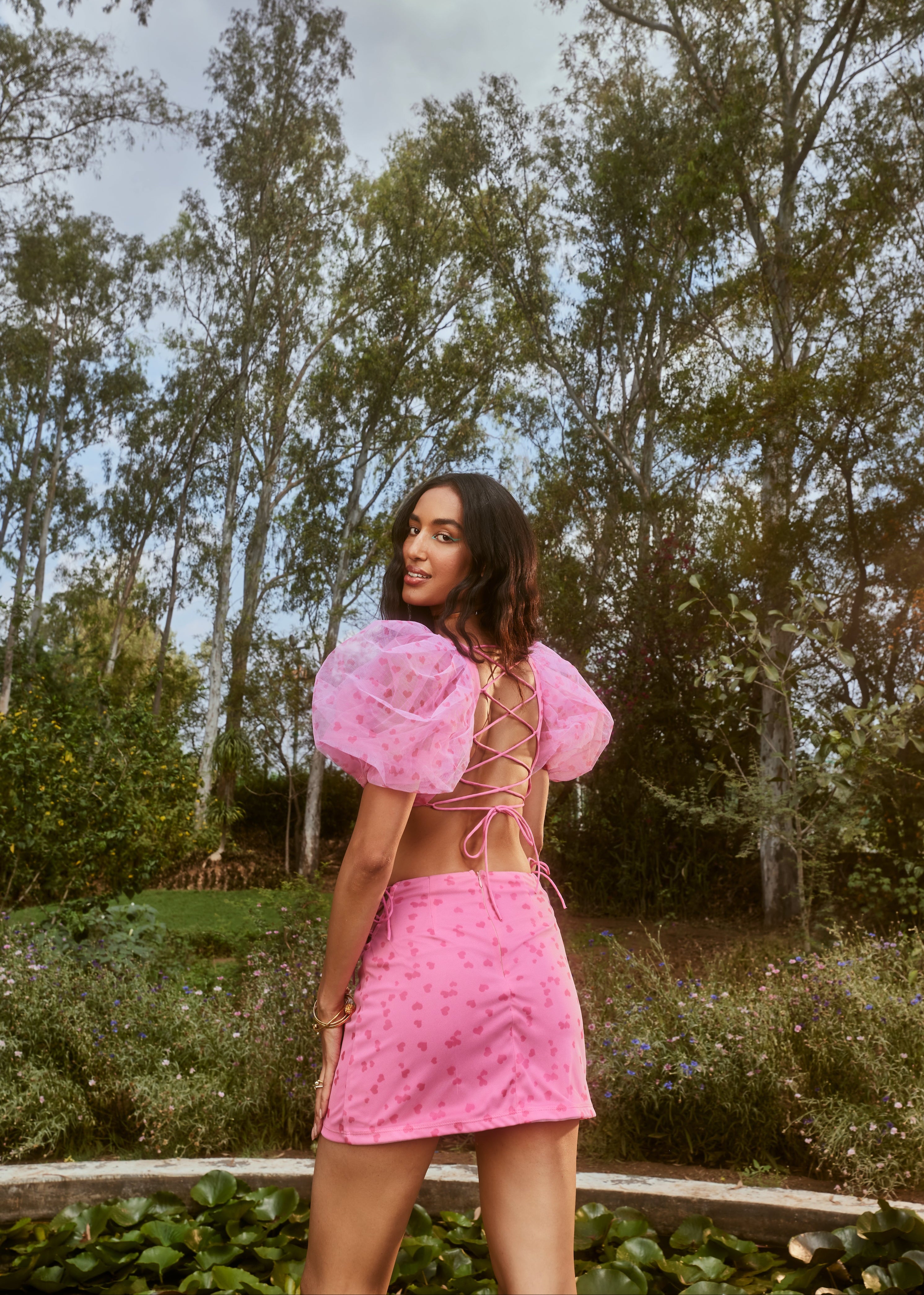 Cleo Pink Heart Print Coord Set with a playful heart pattern on both the top and bottoms in a vibrant pink hue